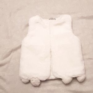 White faux fur pon pon trim vest. Brand new.